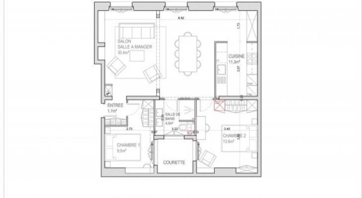 L’appartement après travaux, après la création d’une grande pièce à vivre avec cuisine ouverte.